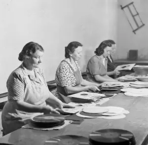 Zavody: Czechoslovakia - 1948. Workers wrap records at