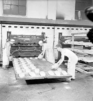 Dought: Czechoslovakia, Prague 1947. Bakers placing dought