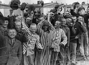 Lcgr1509: Dachau Prisoners wave and cheer the Seventh US Army