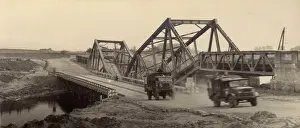 The Kathy Butler Collection: Damaged bridge on a river crossing