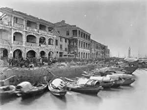 Beached: Damaged buildings on quayside, China