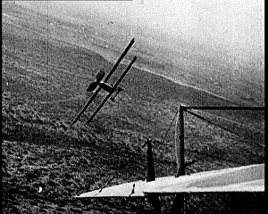 Plummeting: A Damaged German Biplane Plummeting Towards the Ground