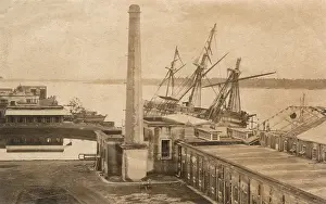 Mast: Damaged ship at a quayside