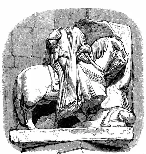 Etienne: Damaged statue of William of Normandy (William