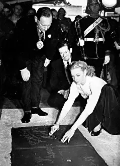 Lyne: Dancer Belita getting her hands cemented into the sidewalk