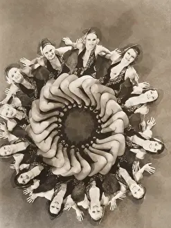 1910s 1940s: Dancers forming a circle with their legs