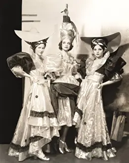 1910s 1940s: Three dancers in long dresses and large hats