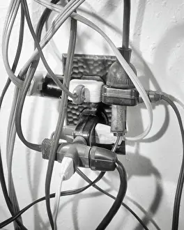 Cords: Dangerous Overloaded Electrical Outlet with Expansion