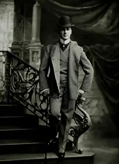 Portait: Dapper Man in Bowler Hat With Cane
