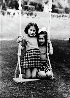 Farouk: Daughters of King Farouk of Egypt on a swing