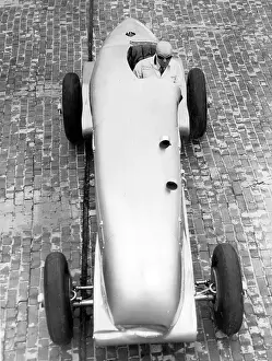 Racer: Dave Evans in a racing car, 1935