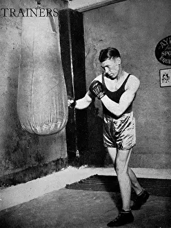 Welterweight: Dave McCleave using a punch bag, 1936