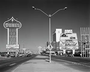 Marquees: Daytime the strip with signs for the dunes mgm