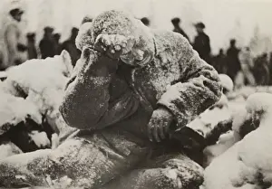 Dusting: Dead Russian soldier sitting, covered with ?