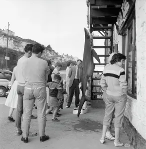 The Norman Synge Waller Budd Collection: Dead shark and window-shopping holidaymakers