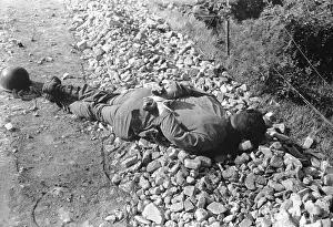 East Asia: Dead U.S. soldier shot thru the head with his hands
