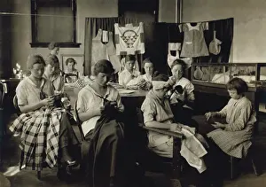 Impaired: Deaf-mute girls sewing and darning in a ?