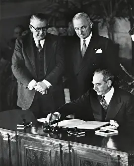 Alben: Dean Acheson, Sec. of State, signs the North Atlantic