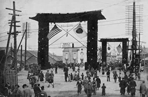 Naval Power: Decorated gates in Yokohama, with flags of the US
