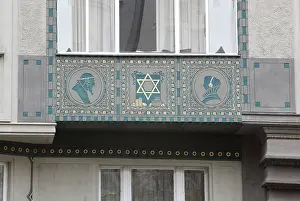 Josefov: Detail of a decorative panel under a window on