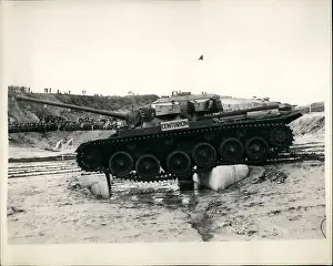 Negotiates: Demonstration of obstacle crossing, Bovington Camp, UK