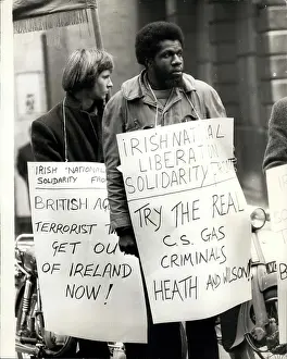 Roche: Demonstrators with placards outside Old Bailey, London