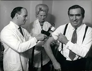Influenza: Denis Healey receiving inoculation against the flu