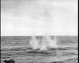 Charges: Depth Charges Splashing Into the Water