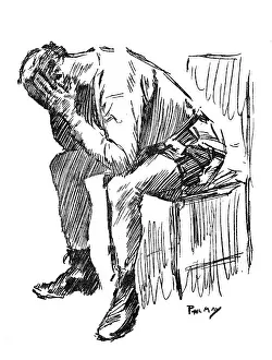 Despairing: Despairing man with his head in his hands