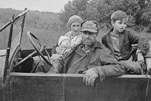 Shahn: A destitute family with their old car in ?