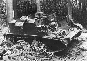 Corpses: Destroyed British Universal Carrier after the airborne l
