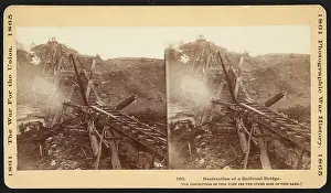 Smoldering: Destruction of a railroad bridge