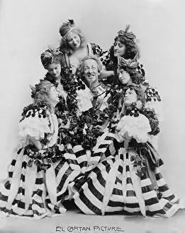 Sousa: DeWolf Hopper, (1858-1935) surrounded by ?