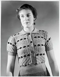 Fastens: DIAMOND PATTERN JUMPER