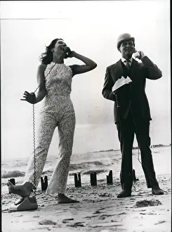 Guiness: Diana Rigg and Patrick Macnee as The Avengers