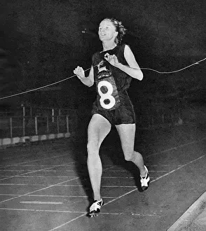 Harriers: Diane Leather winning the mile race