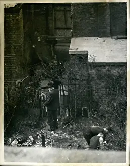 Resume: Digging at murder scene, garden of Rillington Place, London