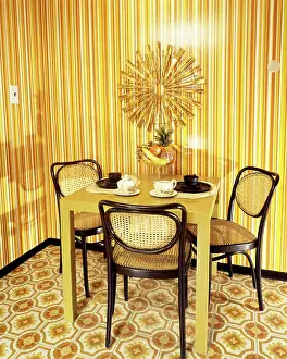 Nook: Dining Nook with Orange and Yellow Striped Wallpaper