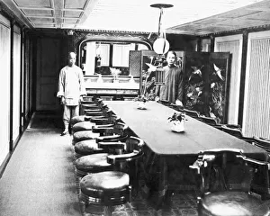 Waiters: Dining room with two waiters, China