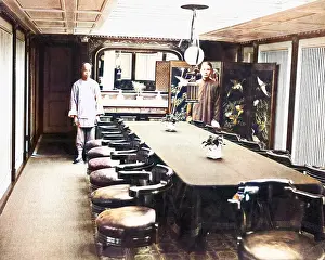 Waiters: Dining room with two waiters, China