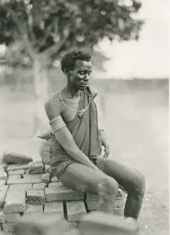 Bahr: Dinka - dressed in a towel, which Hugo Bernatzik