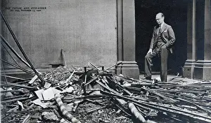 Rothenstein: Director of the Tate Gallery, inspecting damage