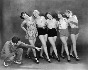 Coordinate: Director working with female dancers