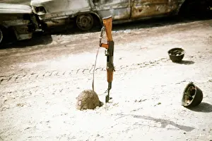 Kalashnikov: Discarded Iraqi helmets scattered around ?