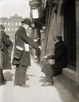 Helpless: Disfigured man begging on the street in ?