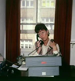 Emberton: DISGRUNTLED RECEPTIONIST