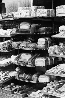 Unwrapped: Display of bread and cakes in a bakery