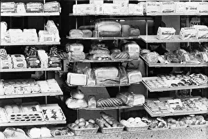 Unwrapped: Display of bread and cakes in a bakery