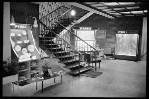 Cookware: Display cabinets containing Pyrex cookware next