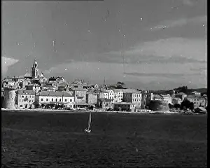 Somewhere: A Distant View of a Coastal Town Somewhere